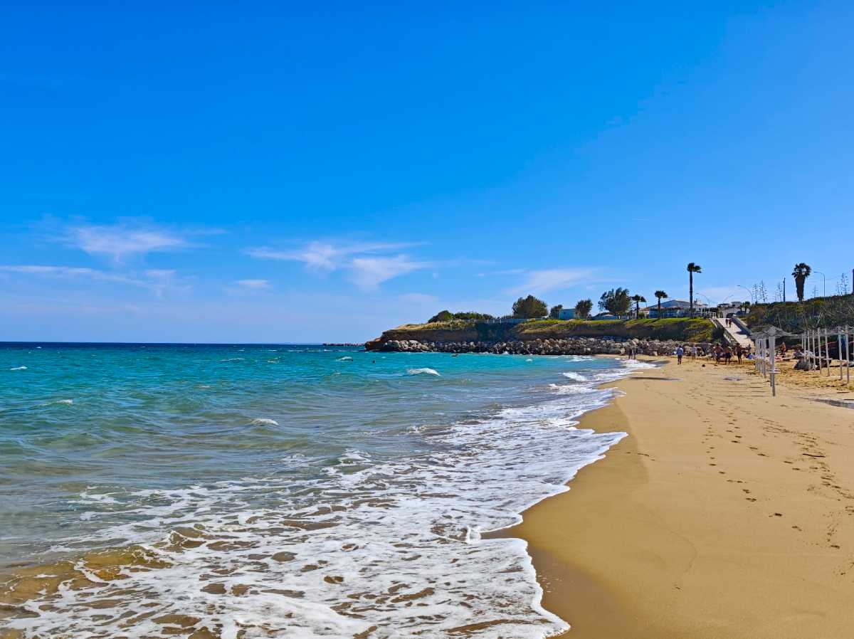 Turquoise sea and golden sand along the coast near Noto in southeastern Sicily