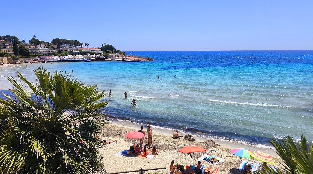 The white sand and clear shallow water of Fontane Bianche beach near Siracusa
