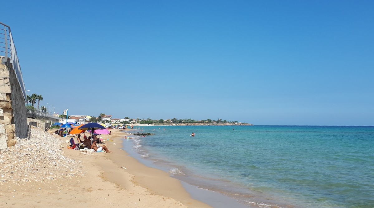 The seafront promenade and sandy town beach of Lungomare Tremoli in Avola