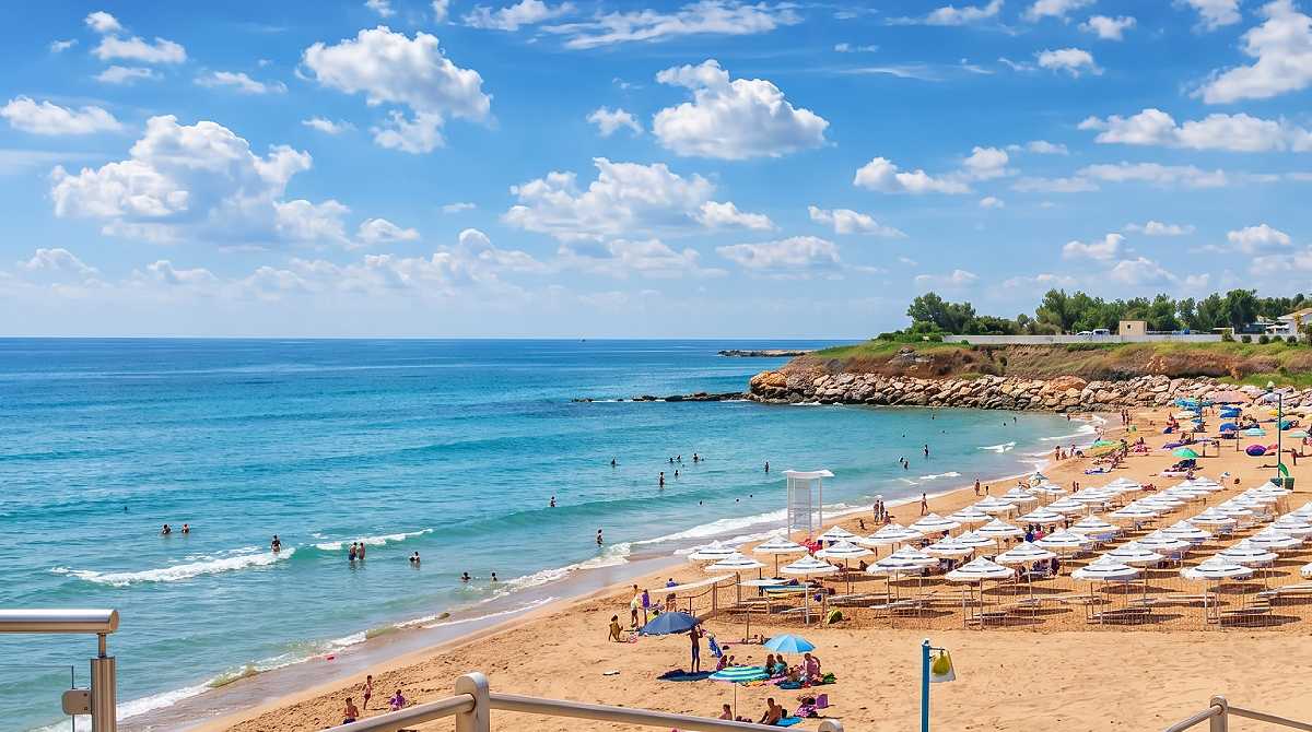 The horseshoe bay of Pantanello beach in Avola with shallow calm water