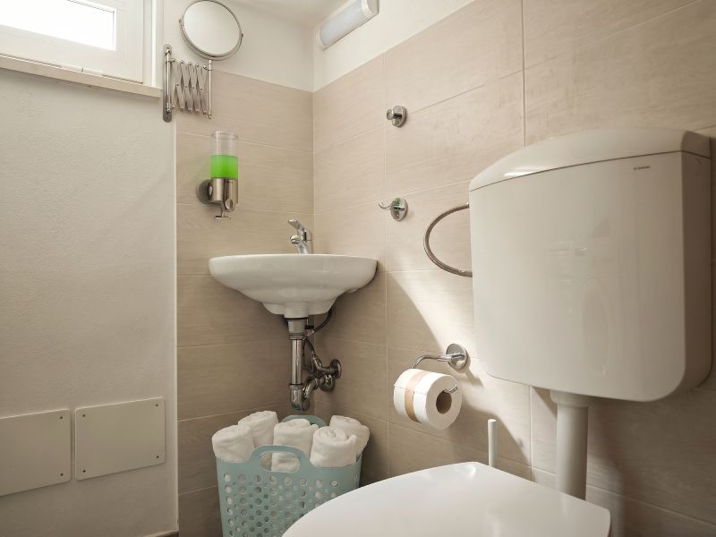 Guest bathroom with sink and toilet